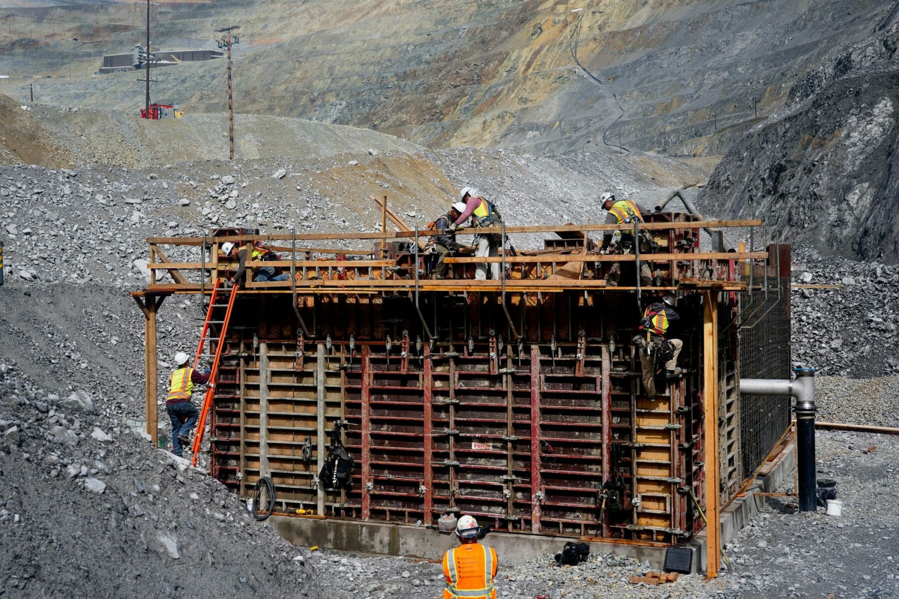 Contractors Setting Cement Foundation during process piping installation in Utah mine | Judson Construction Company