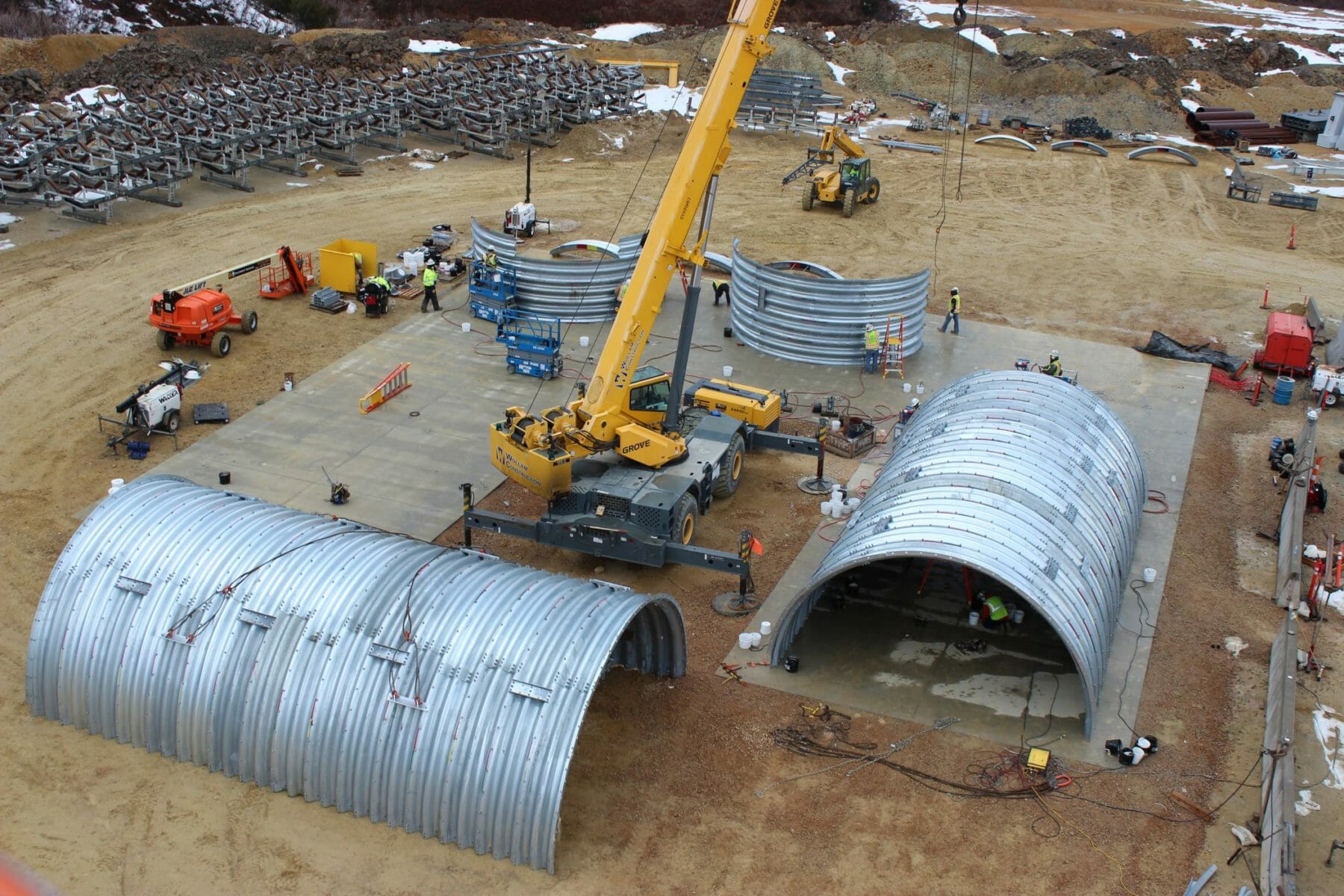 Piping Crew Preparing Metal Pipes