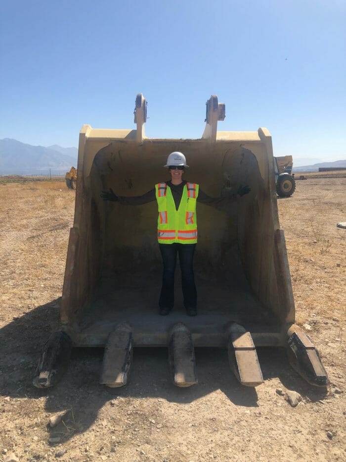 Woman In Excavator Bucket